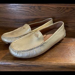 COACH metallic gold driving shoe